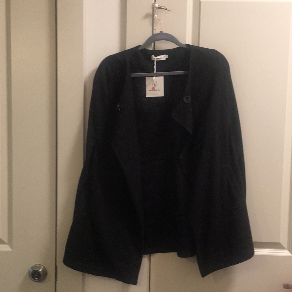 Cape with pockets